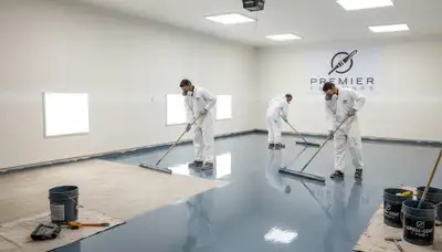 Epoxy garage floor coating installation by professional painters in Cleveland, OH